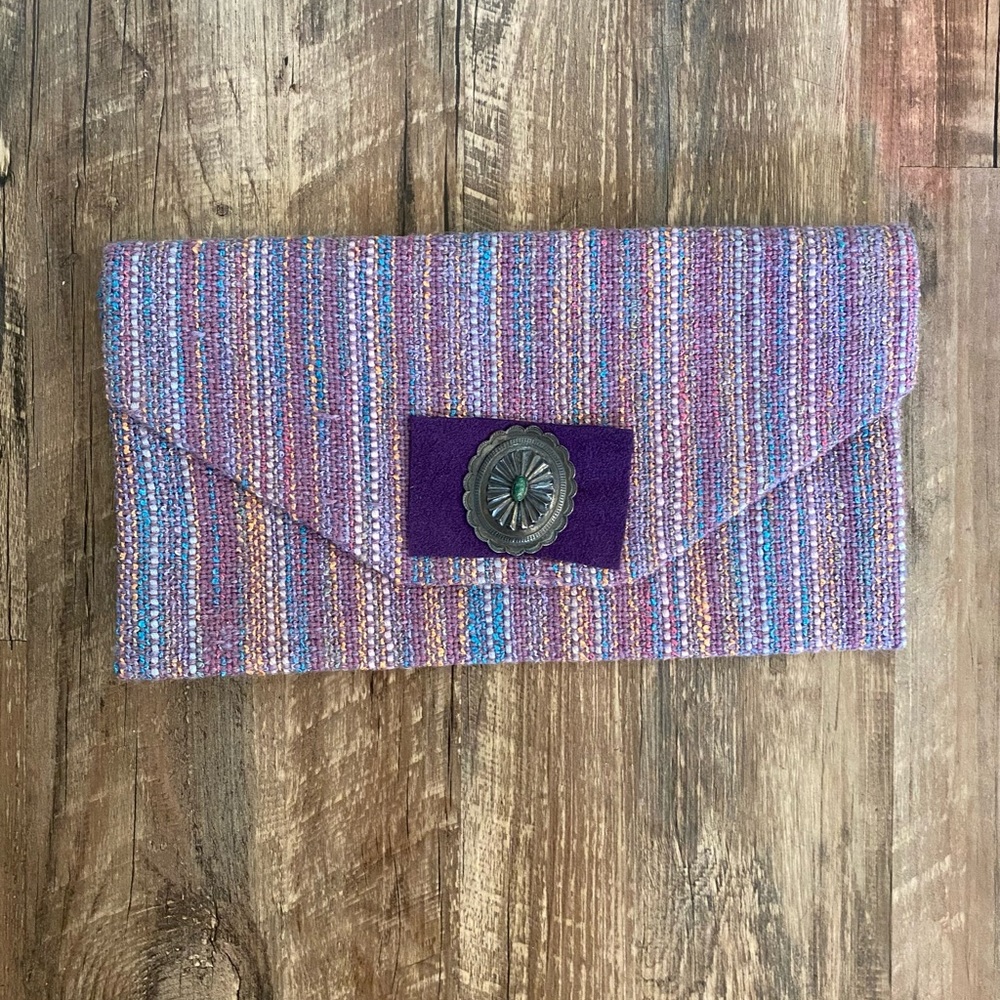 Handwoven cosmetics bag with cabachon set stone!